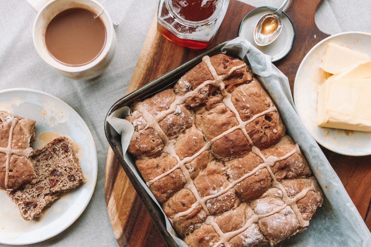 A table of Easter Hot Cross Buns